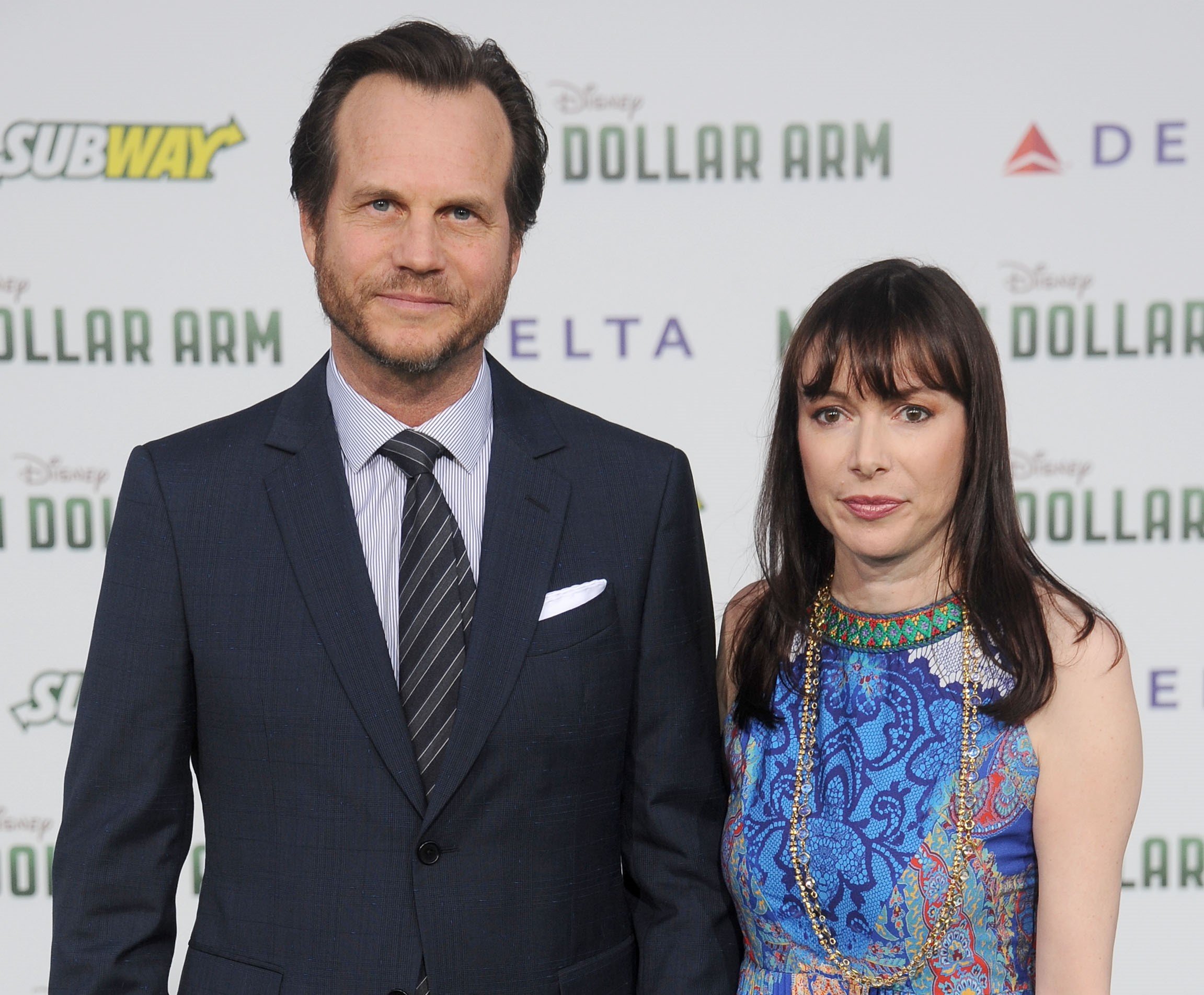 Bill Paxton and wife Louise Newbury at the Los Angeles premiere of "Million Dollar Arm"in 2014, in Hollywood, California. | Source: Getty Images