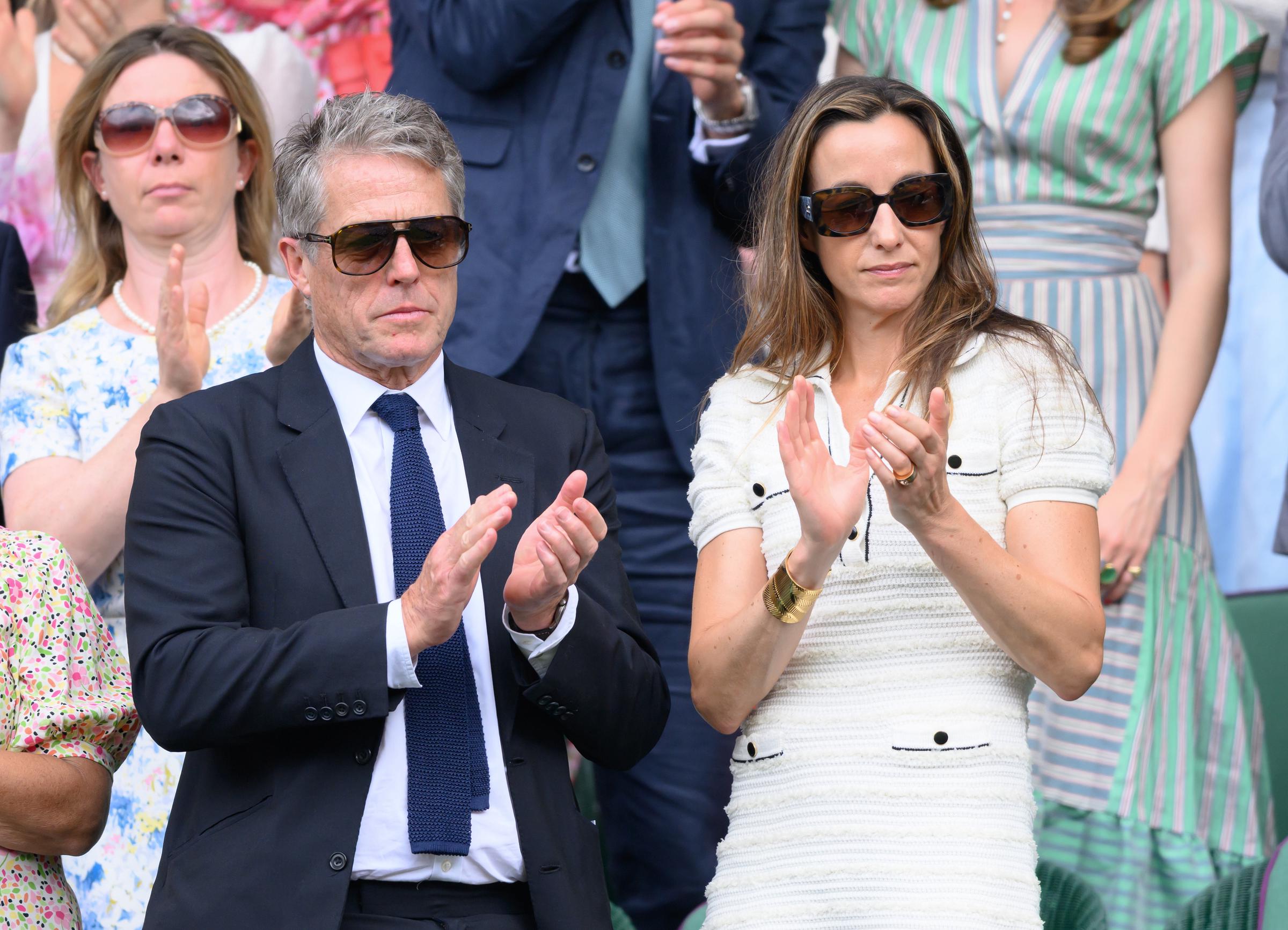 Hugh Grant and Anna Elisabet Eberstein attend day ten of the Wimbledon Tennis Championships at the All England Lawn Tennis and Croquet Club on July 9, 2025, in London, England | Source: Getty Images