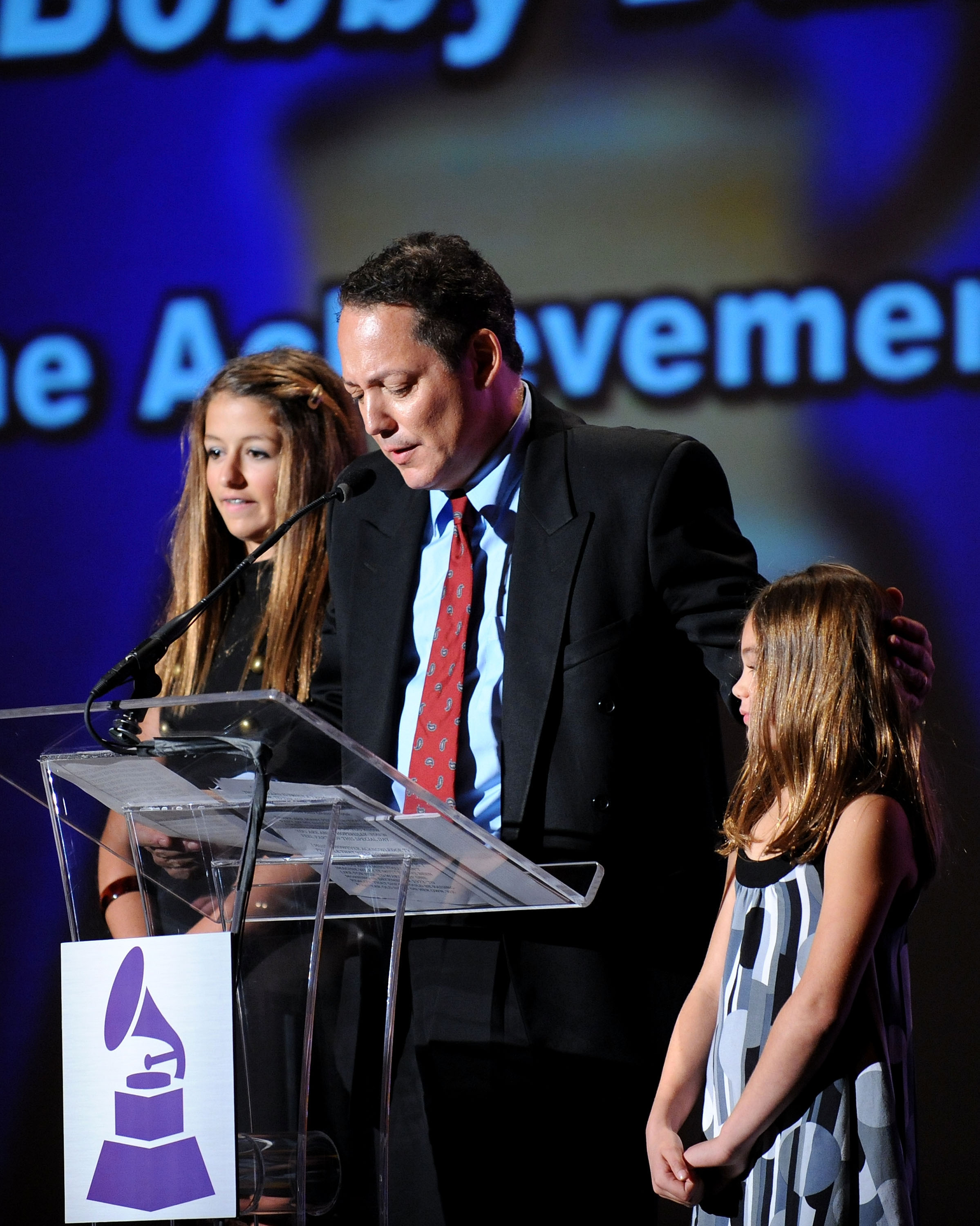 Alexa Darin, Dodd Darin and Olivia Darin accept the Lifetime Achievement Award on behalf of the late Bobby Darin at The Wilshire Ebell Theatre on January 30, 2010, in Los Angeles, California. | Source: Getty Images