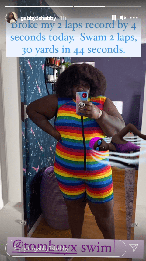 Gabourey Sidibe rocking a skin-tight rainbow-colored swimsuit | Photo: Instagram/gabby3shabby
