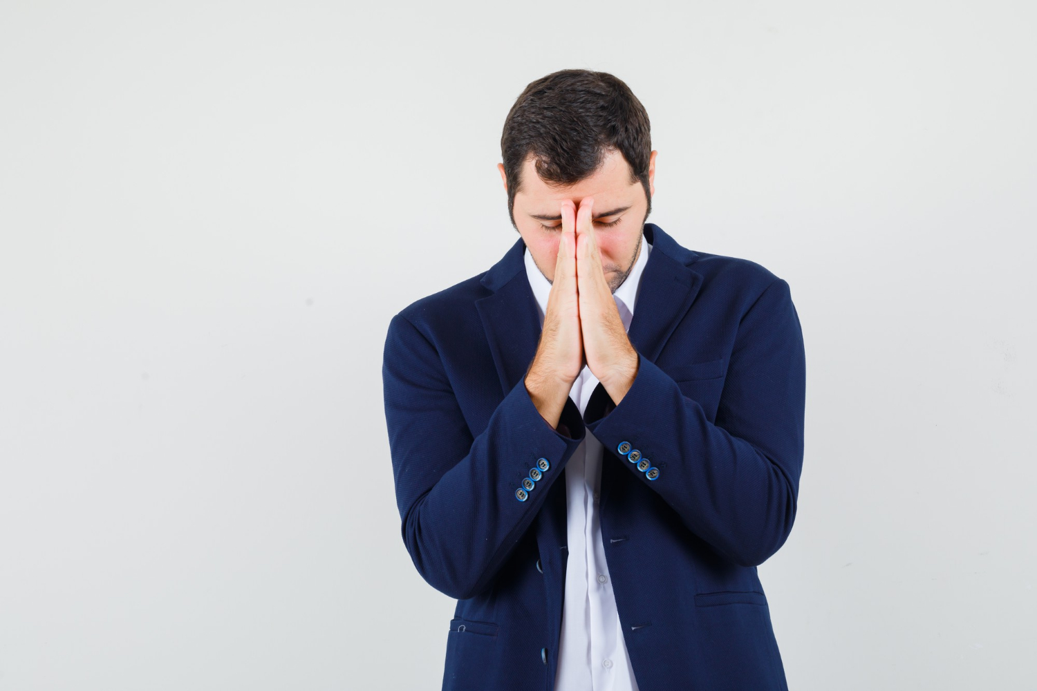 An apologetic man | Source: Freepik
