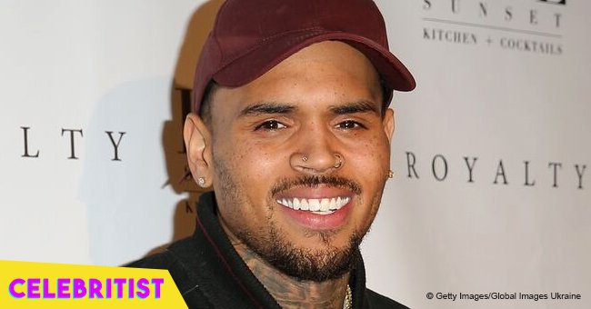 Chris Brown melts hearts with photo of smiling daughter in light pink dress & matching hair-band