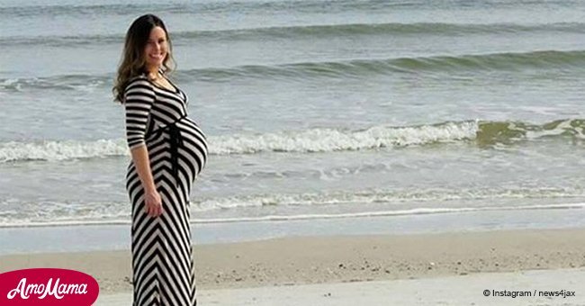 Picture of pregnant woman has gone viral thanks to dolphin photobomb