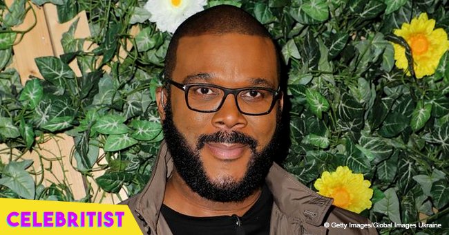 Tyler Perry's girlfriend shows off her toned figure in black, off-the-shoulder mini dress