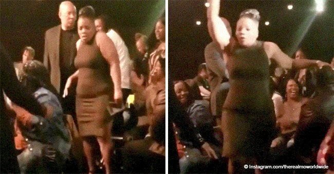 Mo'Nique shows off her slimmer figure, busts out dance moves in tight black dress