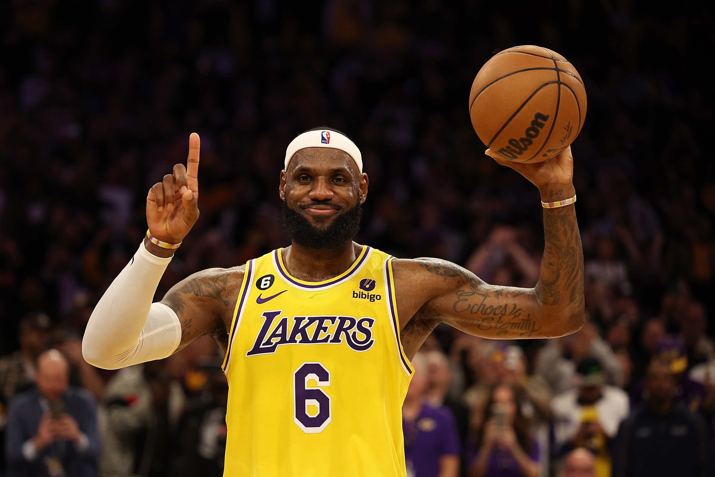 LeBron James reacts after scoring to surpass Kareem Abdul-Jabbar's career total of 38,387 points, becoming the NBA's all-time leading scorer on February 7, 2023 in Los Angeles, California | Source: Getty Images