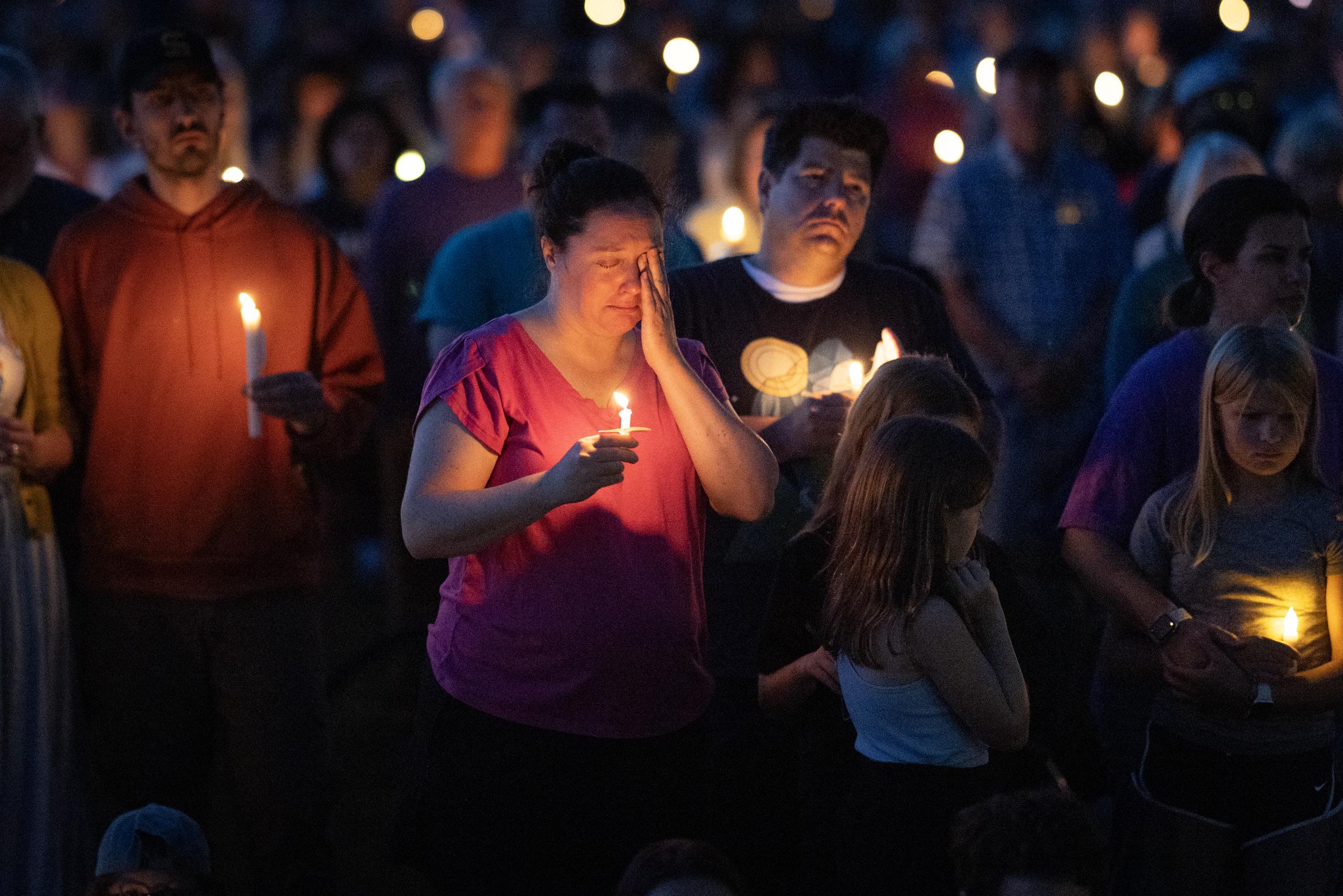People at a vigil at Lynnhurst Park to mourn the dead and pray for the wounded after the gunman opened fire on students at Annunciation Catholic Church on August 27, 2025, in Minneapolis, Minnesota. | Source: Getty Images