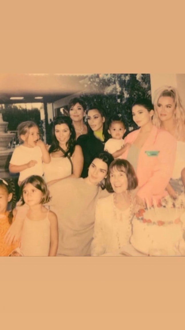 The Kardashian-Jenner family posing with MJ. | Source: Instagram/khloekardashian