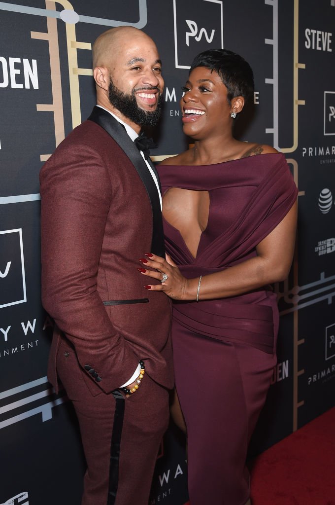 Kendall Taylor shared a laugh with his wife Fantasia Barrino as they posed on the red carpet at th Primary Wave Entertainment's 12th Annual Pre-Grammy Party on January 27, 2018, New York |Source: Jamie McCarthy/Getty Images for Primary Wave Entertainment