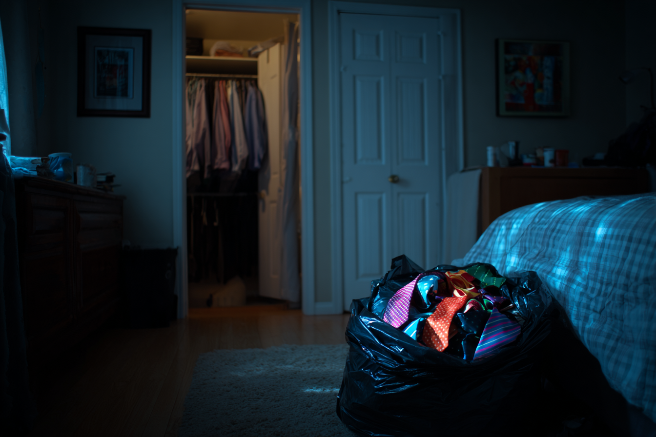A trash bag full of ties | Source: Midjourney