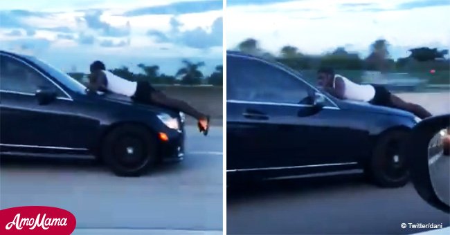 Dramatic moment man makes 911 call while clinging to the hood of a speeding car (video)