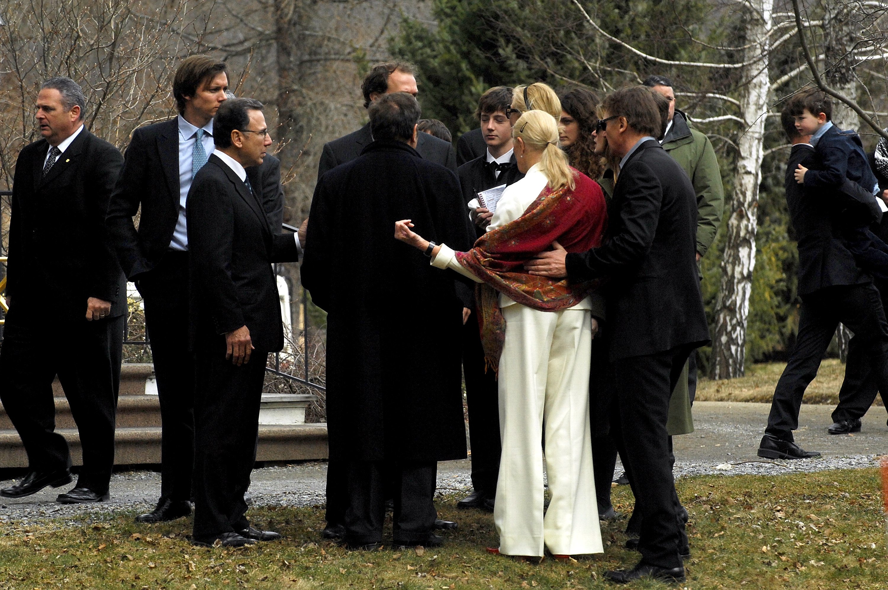 Vanessa Redgrave (2nd-R) and actor Liam Neeson (R) gather together with family prior to the funeral of actress Natasha Richardson at St. Peter's Lithgow Episcopal Church on March 22, 2009 in Lithgow, New York | Source: Getty Images 