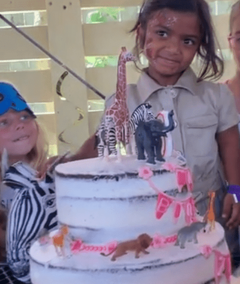 Zoey getting ready to blow out her candles on her birthday cake | Instagram: @jenarnoldmd 