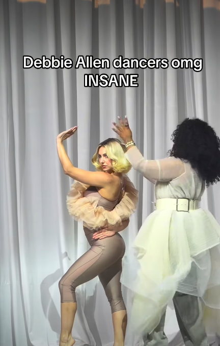 A hairdresser doing a dancer's hair as she performs. | Source: Instagram/elizabethdenton