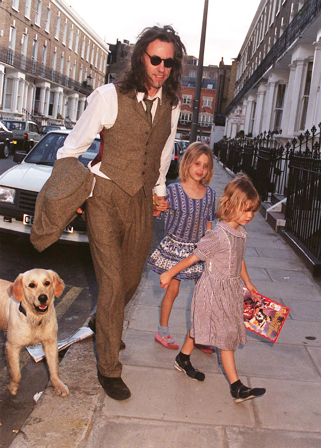 Bob Geldof photographed with his daughters, Peaches and Pixie Geldof, on 12 June 1996 in Chelsea, England. | Source: Getty Images