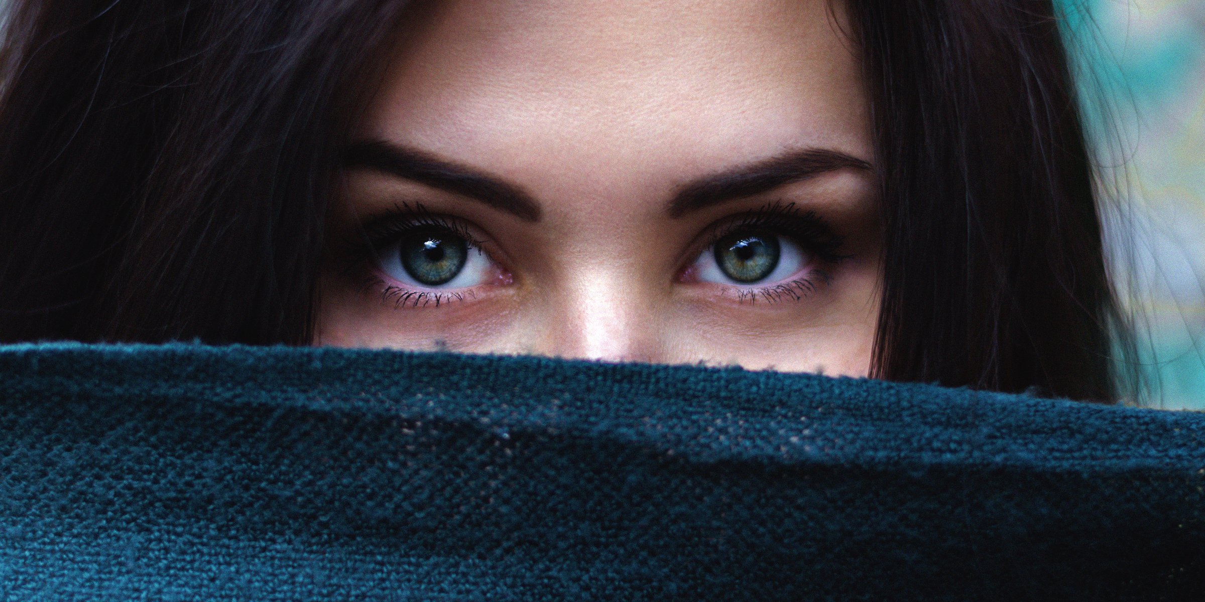 Unsplash | A woman staring into the camera 