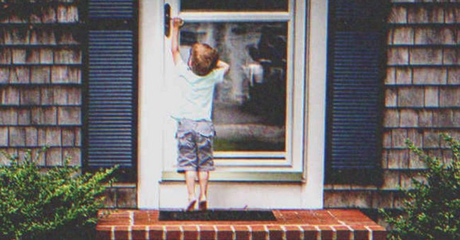 A little boy knocking on a door | Source: Shutterstock