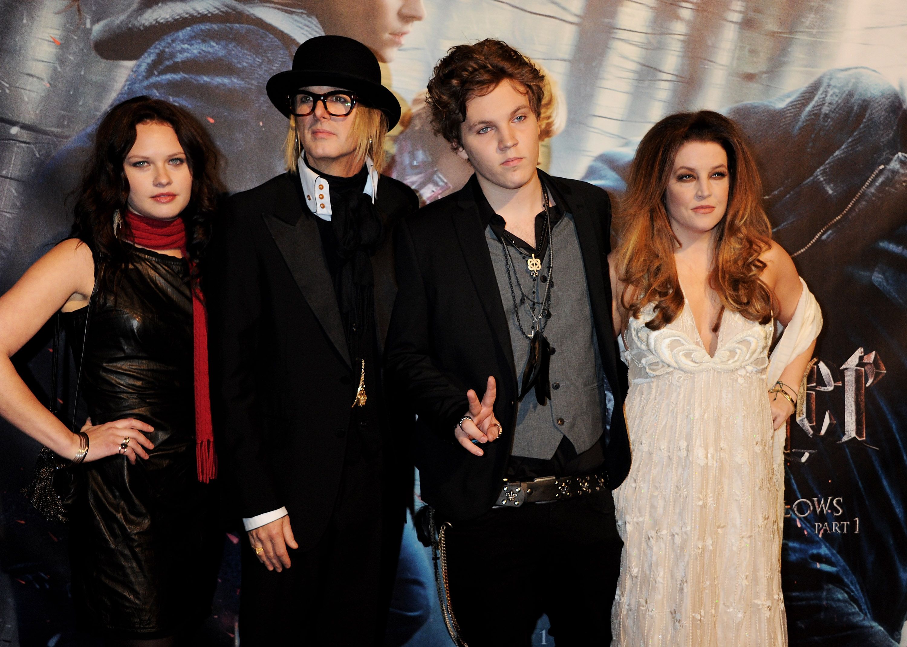 A guest, Michael Lockwood, Benjamin Keough, and Lisa Marie Presley at the World Premiere of "Harry Potter And The Deathly Hallows: Part 1" on November 11, 2010, in London, England | Photo: Dave M. Benett/Getty Images