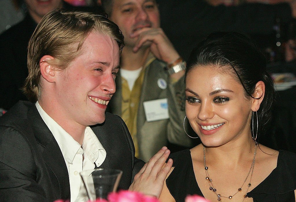 Macaulay Culkin and Mila Kunis at the launch of the "uBid for Hurricane Relief" charity auction, October 15, 2005 | Photo: GettyImages