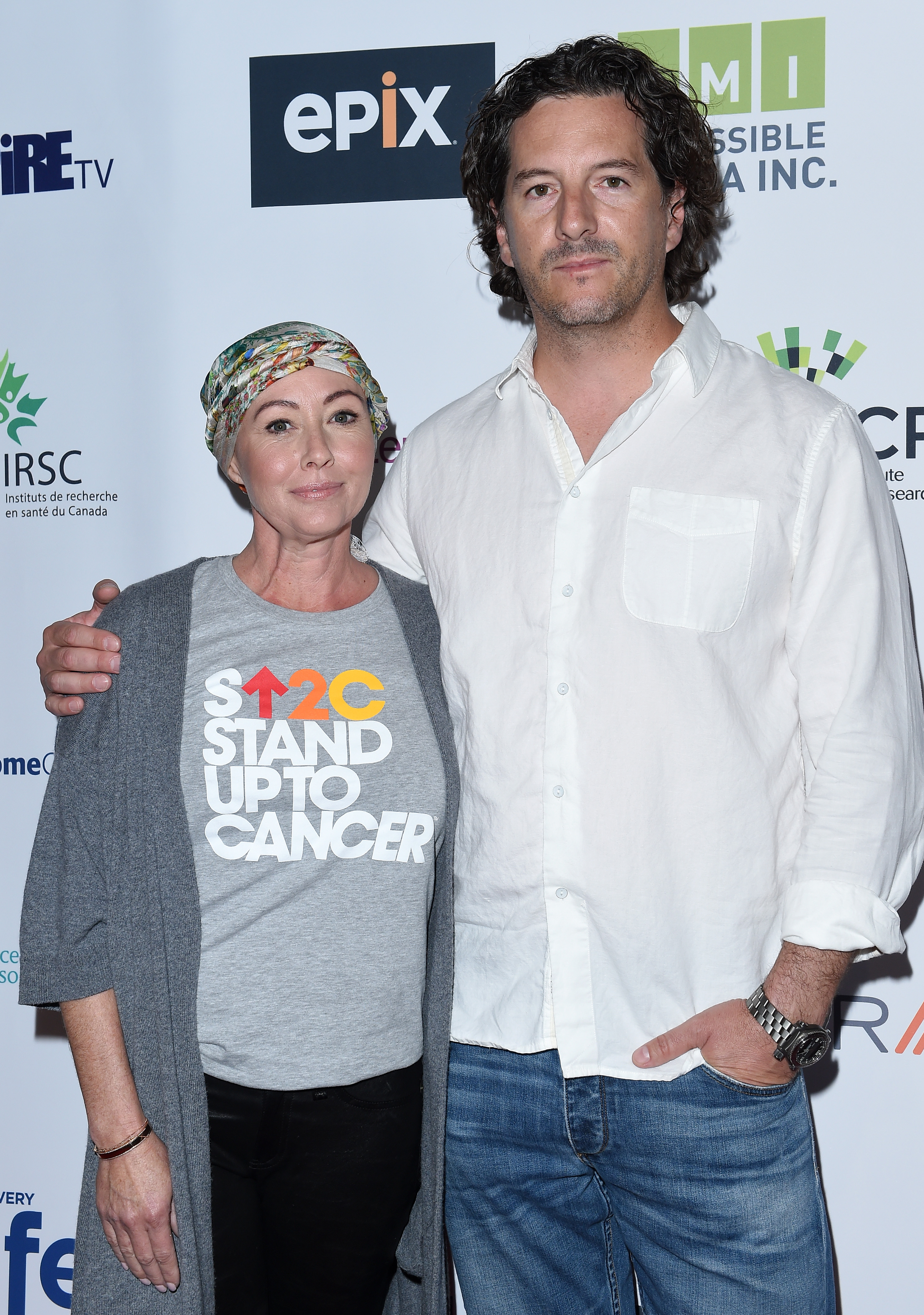 Shannen Doherty and Kurt Iswarienko at the Hollywood Unites for the 5th Biennial Stand Up To Cancer (SU2C) event in Los Angeles, California on September 9, 2016 | Source: Getty Images