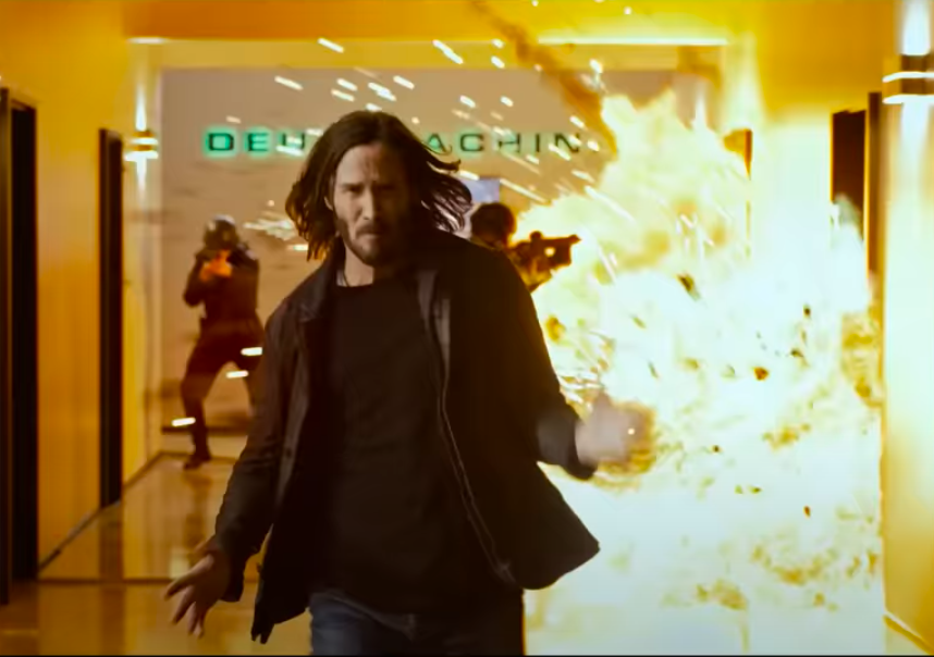 Keanu Reeves in a fight scene from "The Matrix Resurrections," posted on December 6, 2021 | Source: YouTube/Warner Bros. Pictures