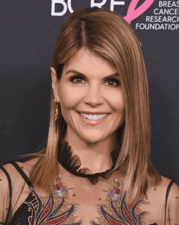 Lori Loughlin poses on the red carpet at The Women's Cancer Research Fund's An Unforgettable Evening Benefit Gala at the Beverly Wilshire Four Seasons Hotel, on February 27, 2018, in Beverly Hills, California | Source: Getty Images (Photo by Jon Kopaloff/FilmMagic)