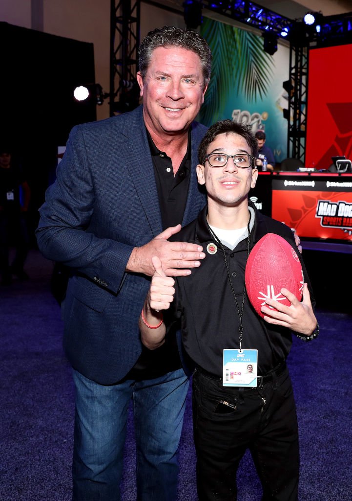 Dan Marino and guest attend day one with SiriusXM at Super Bowl LIV on January 29, 2020 in Miami, Florida. | Source: Getty Images