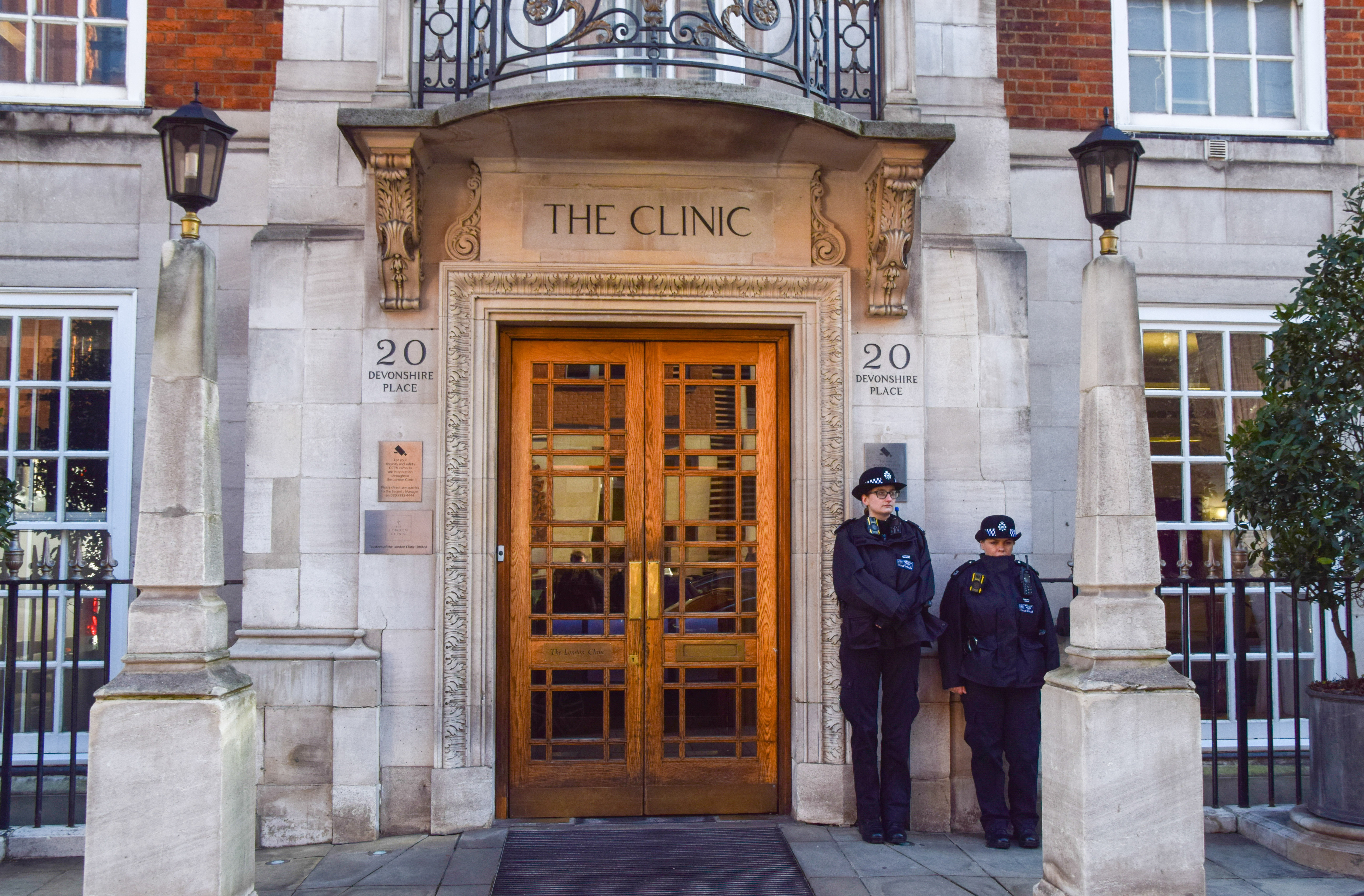 Police officers standing outside the private London Clinic on January 26, 2024 in London, England. | Source: Getty Images