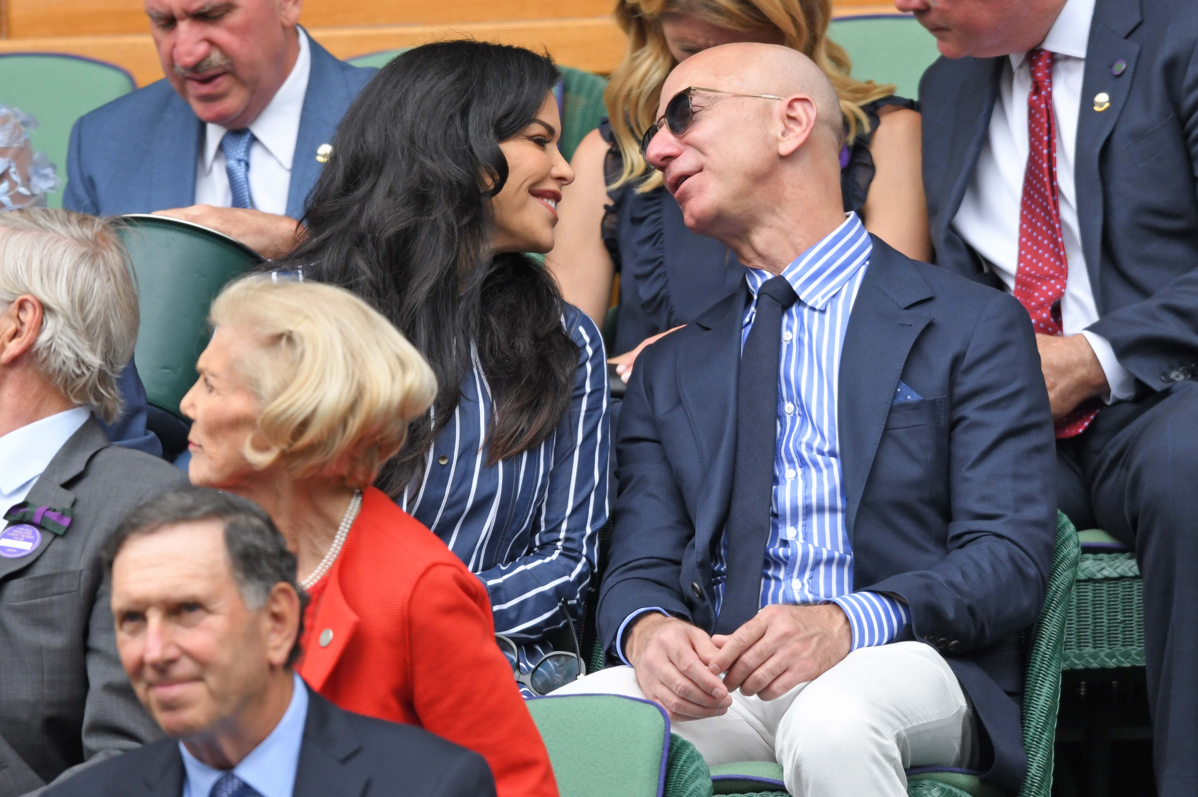 Lauren Sanchez and Jeff Bezos on Centre Court during Men's Finals Day of the Wimbledon Tennis Championships on July 14, 2019, in London, England. | Source: Getty Images