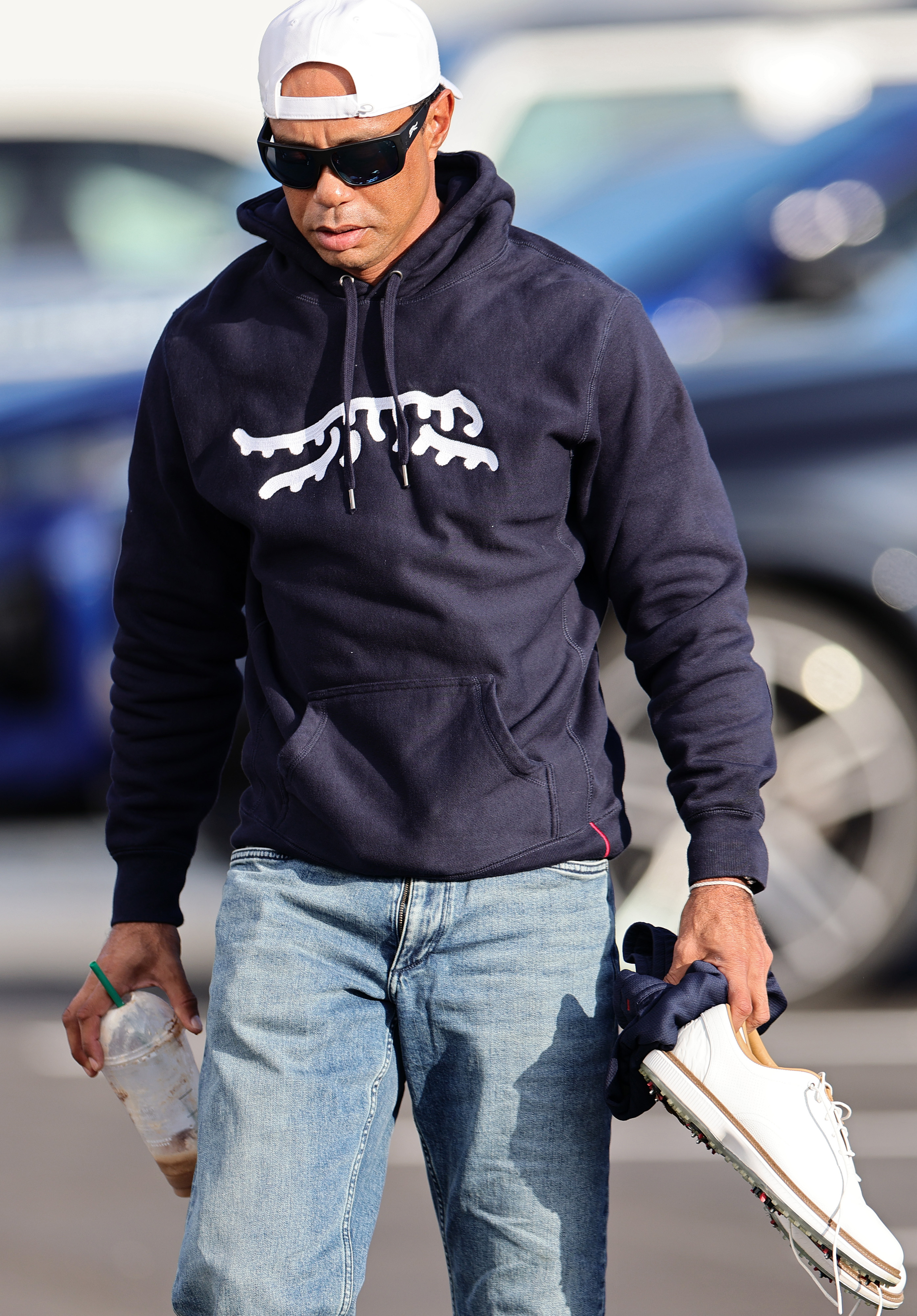 Tiger Woods arrives for a TGL match at SoFi Center in Palm Beach Gardens, Florida, on January 27, 2025 | Source:  Getty Images