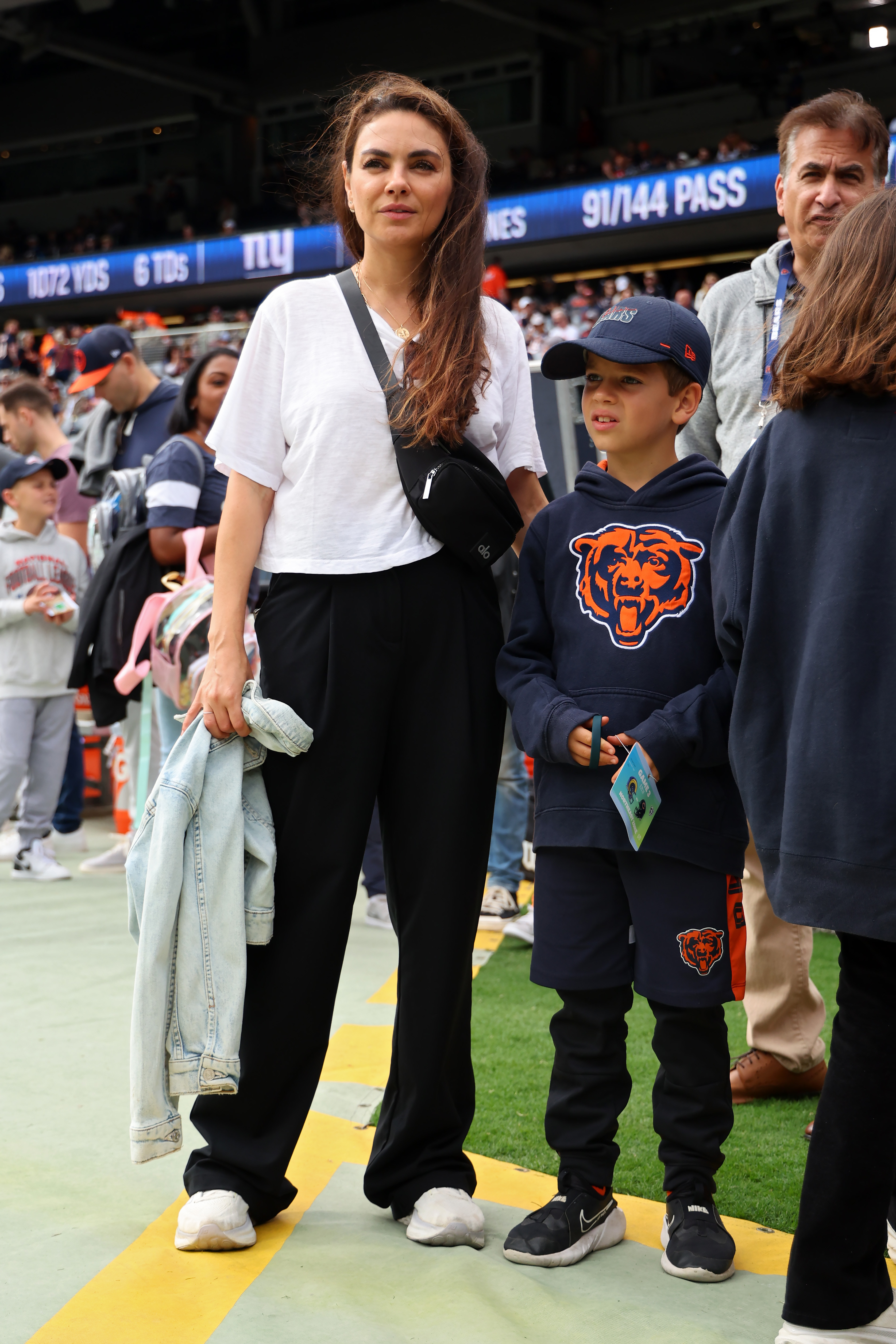 Mila Kunis spotted at a game between the Chicago Bears and the Los Angeles Rams with her son Dimitri Kutcher in Chicago, Illinois on September 29, 2024 | Source: Getty Images