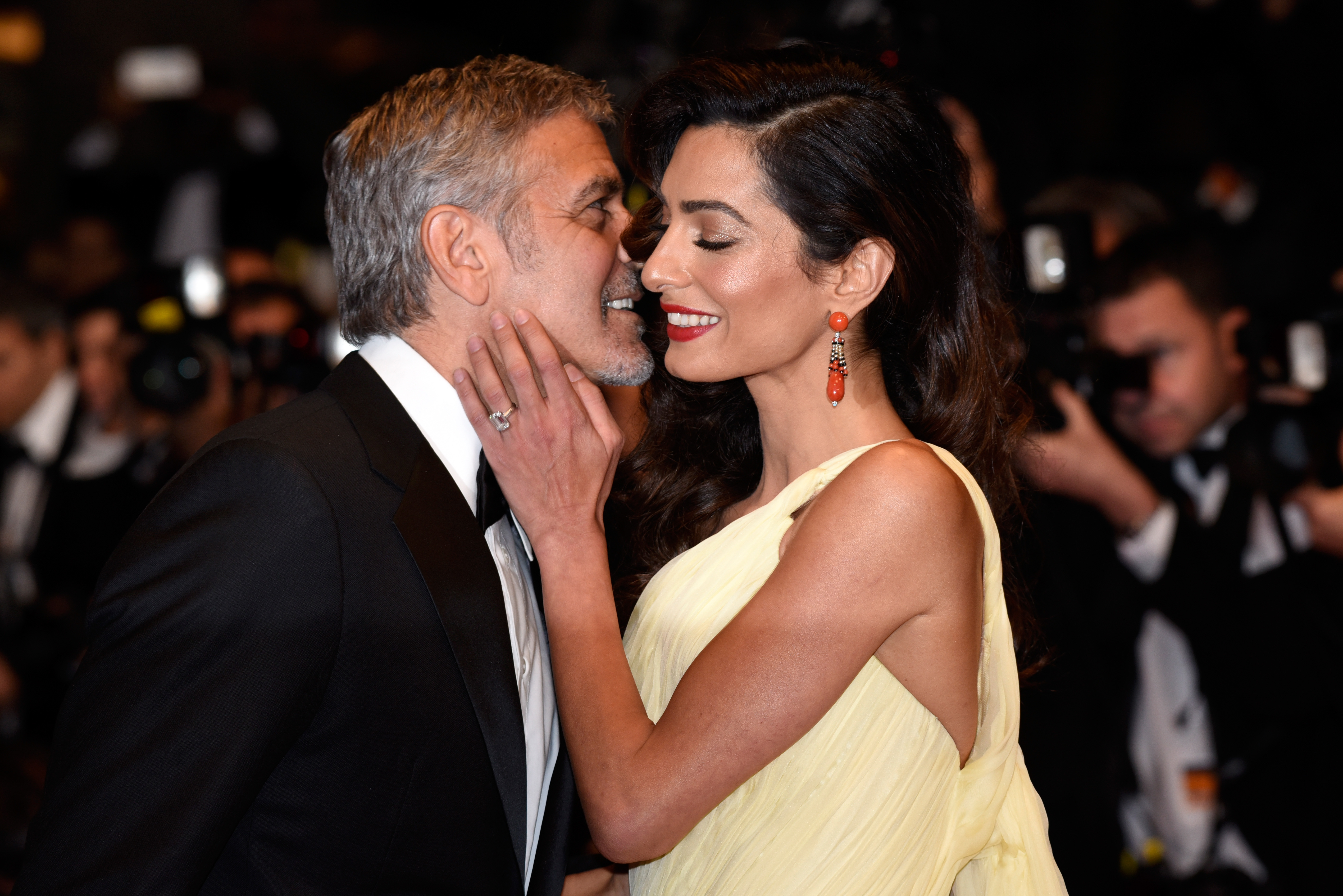 George and Amal Clooney at the premiere of "Money Monster" during the 69th Annual Cannes Film Festival in Cannes, France on May 12, 2016 | Source: Getty Images