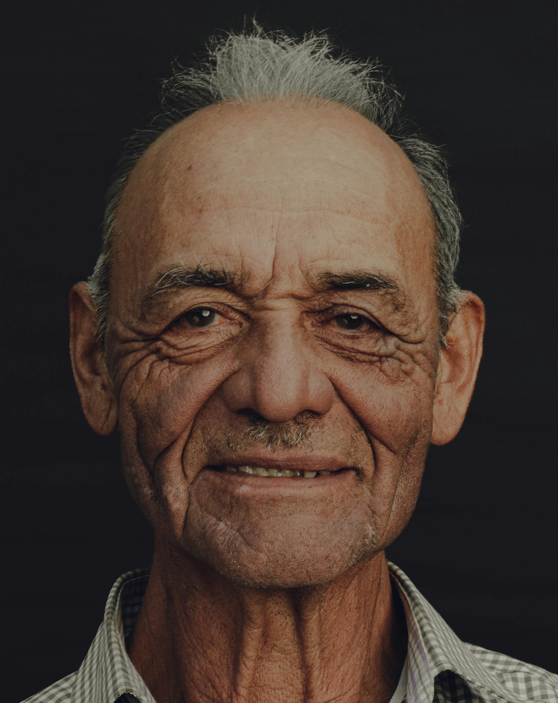 A smiling elderly man | Source: Pexels