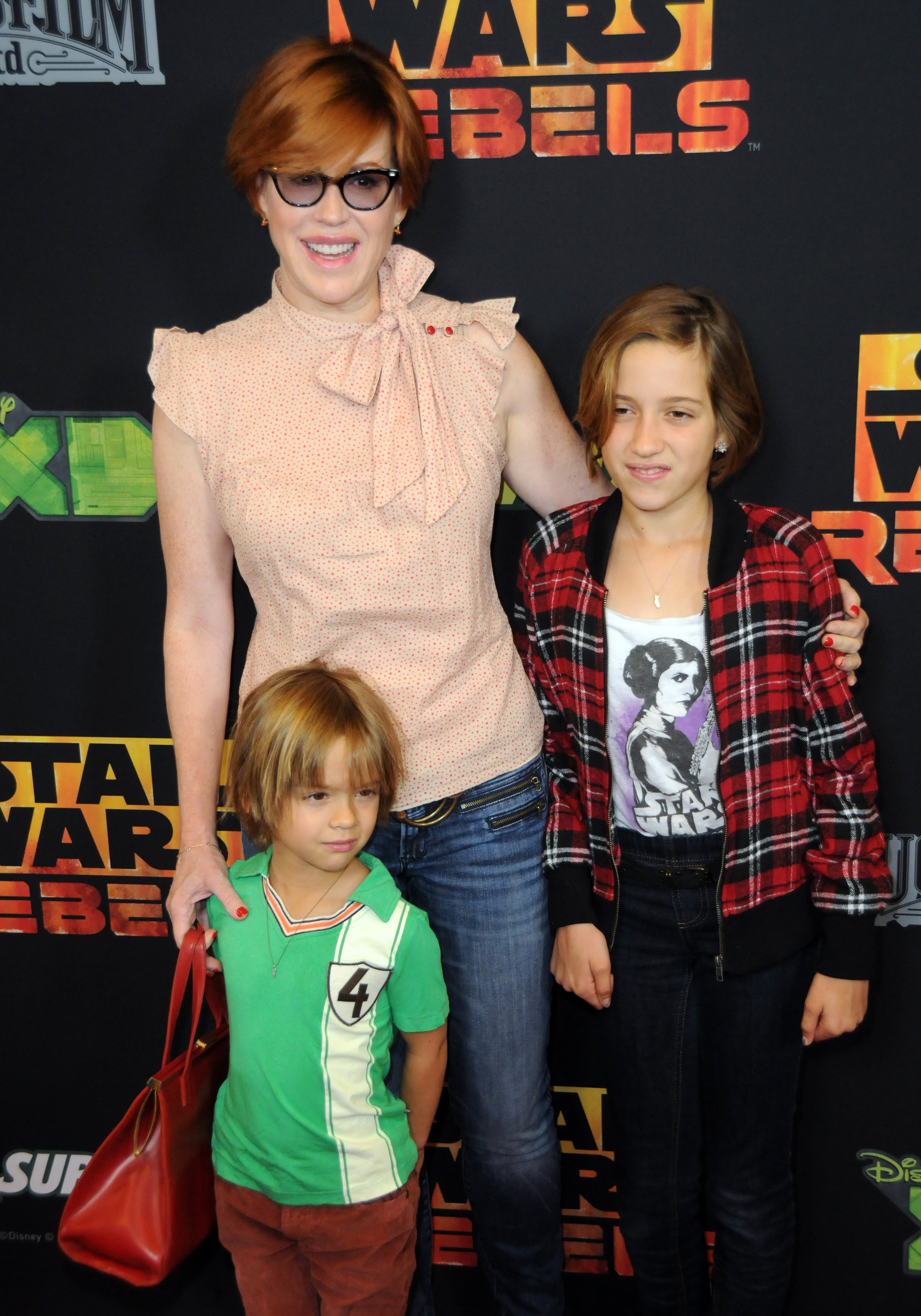 Molly Ringwald and Roman and Mathilda Gianopolous at Disney XD's "Star Wars Rebels: Spark Of Rebellion" screening on September 27, 2014, in California. | Source: Getty Images