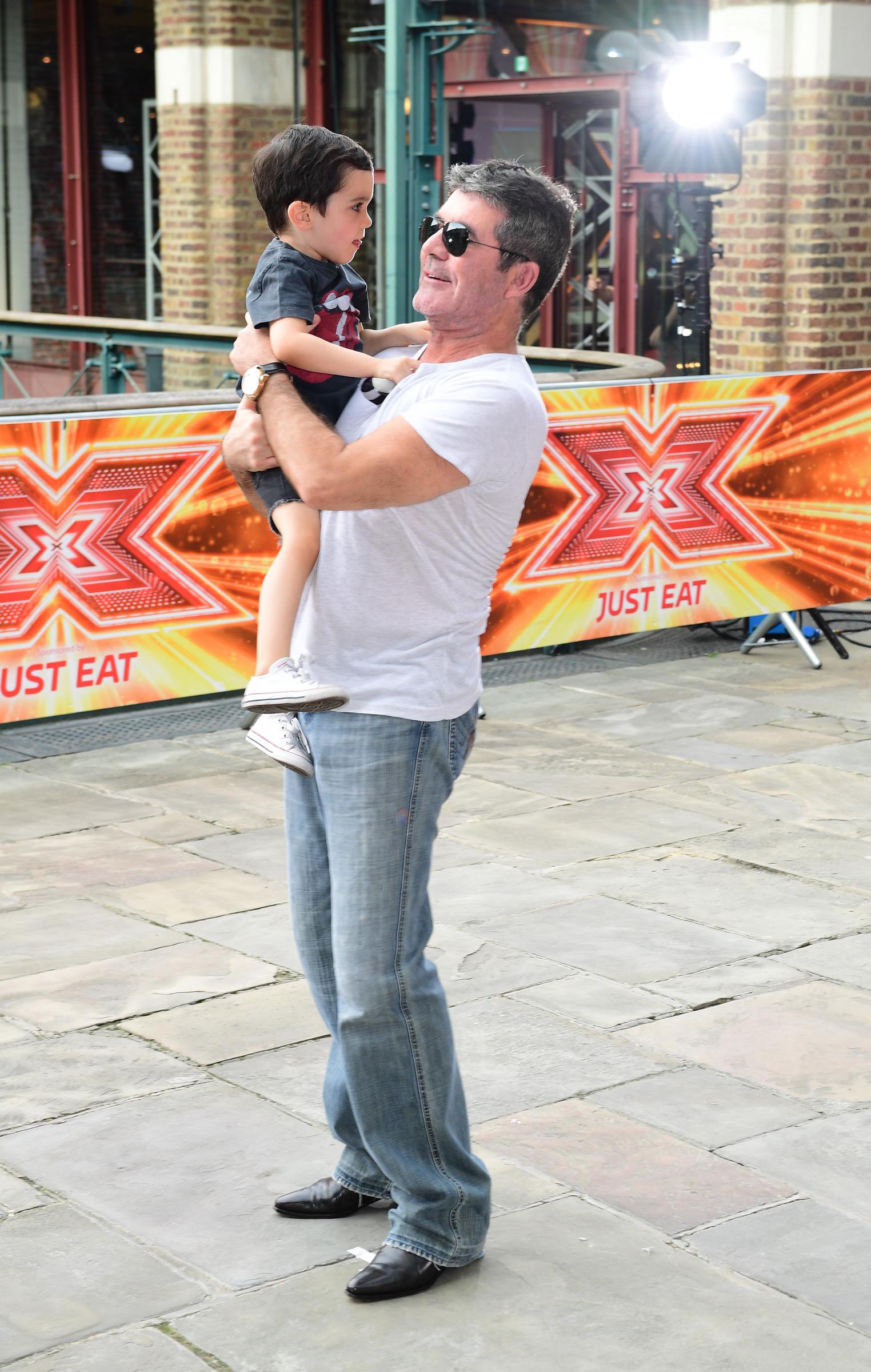 Eric and Simon Cowell during the filming of "The X Factor" in London, England, 2017. | Source: Getty Images