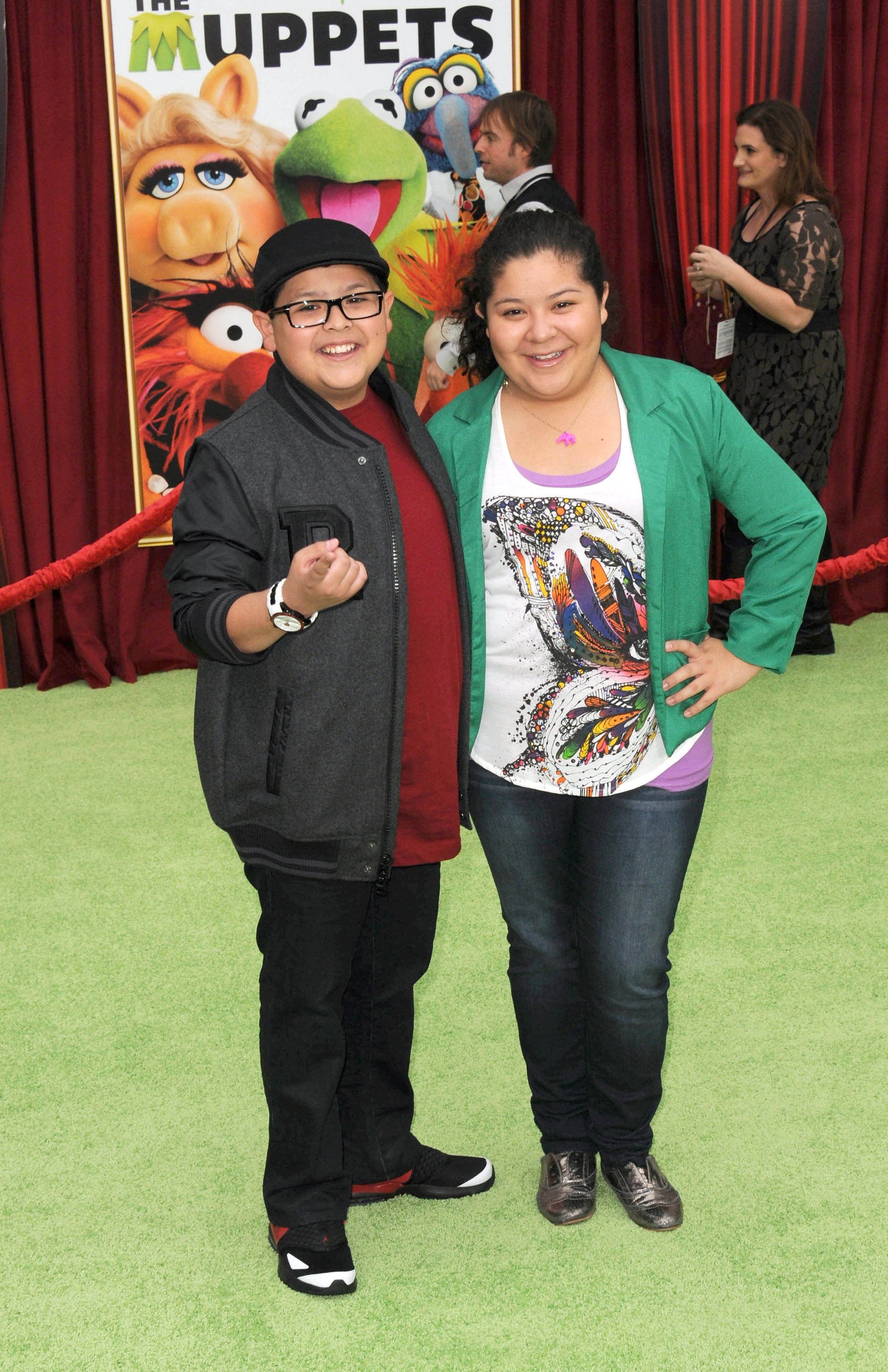 Actor Rico Rodriguez and actress Raini Rodriguez arrive for "The Muppets" Los Angeles Premiere held at the El Capitan Theatre on November 12, 2011, in Hollywood, California | Source: Getty Images