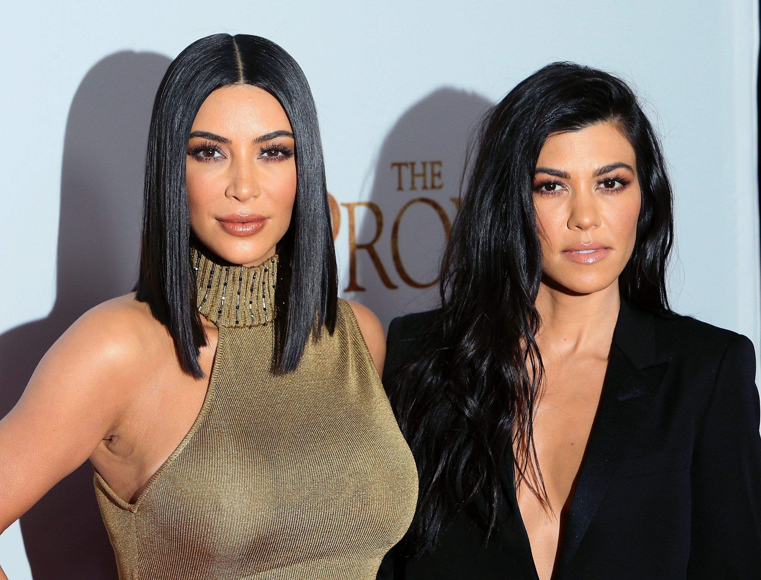 Kourtney and Kim Kardashian attend the premiere night of "The Promise" in April 2017 | Source: Getty Images/GlobalImagesUkraine