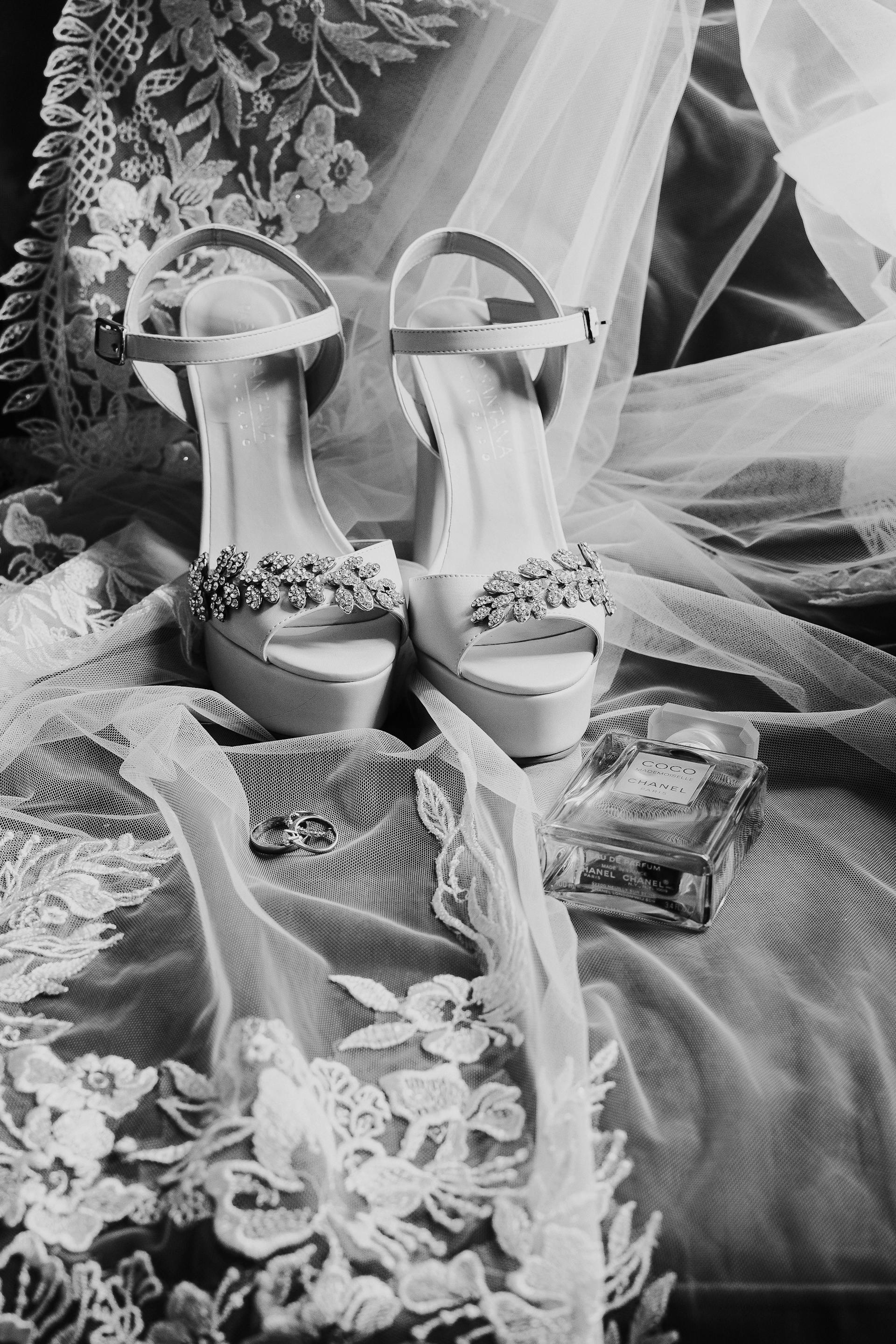 Grayscale shot of bridal accessories | Source: Pexels