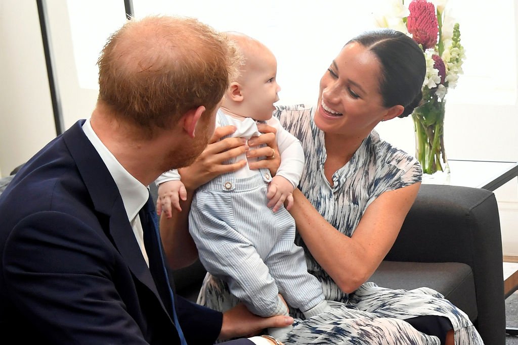 Prince Harry Meghan and their baby son Archie Mountbatten-Windsor meet Archbishop Desmond Tutu. | Source: Getty Images