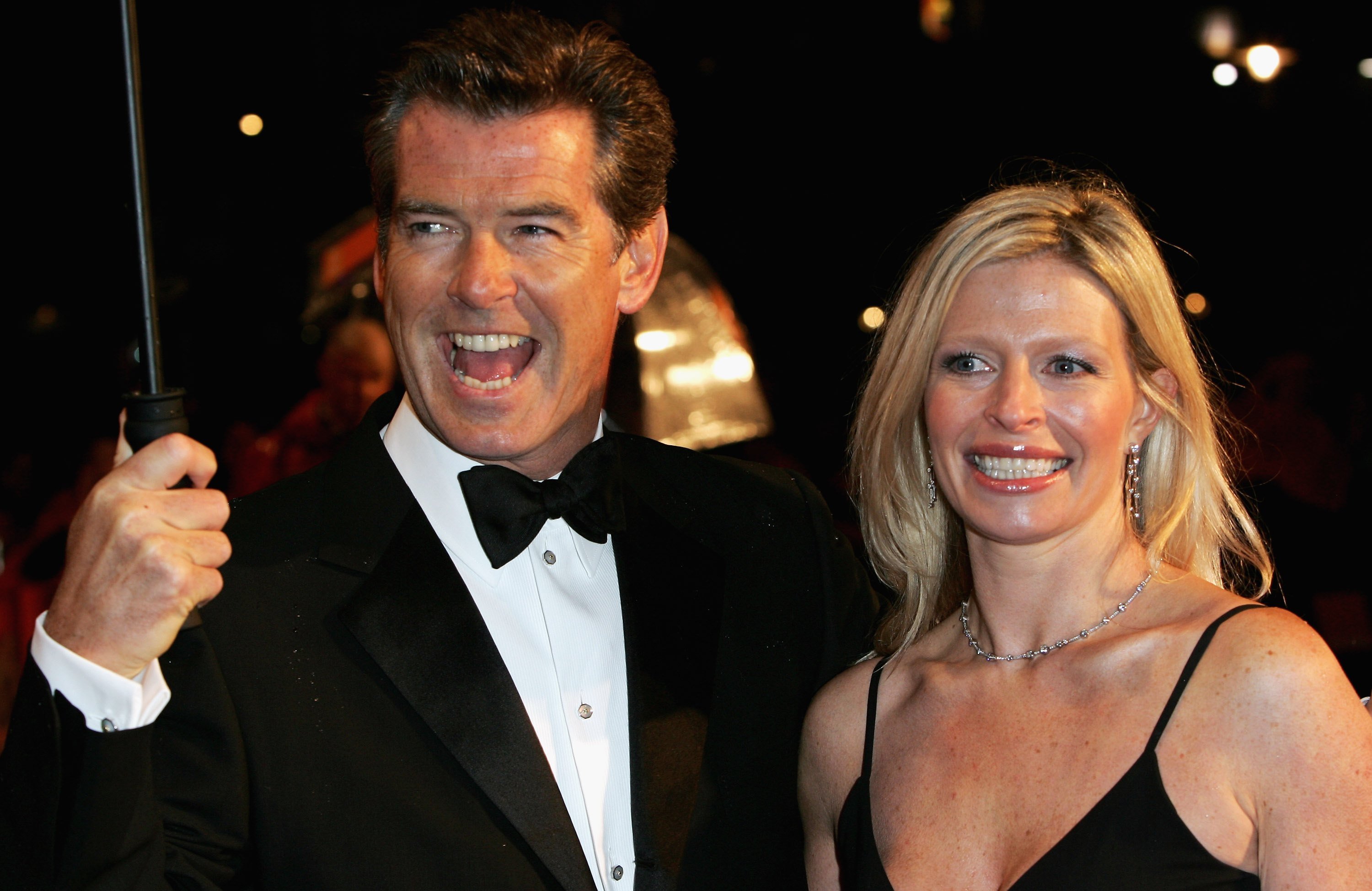 Actor Pierce Brosnan (left) and daughter Charlotte arrives at The Orange British Academy Film Awards (BAFTAs) at the Odeon Leicester Square on February 19, 2006 in London, England. | Source: Getty Images