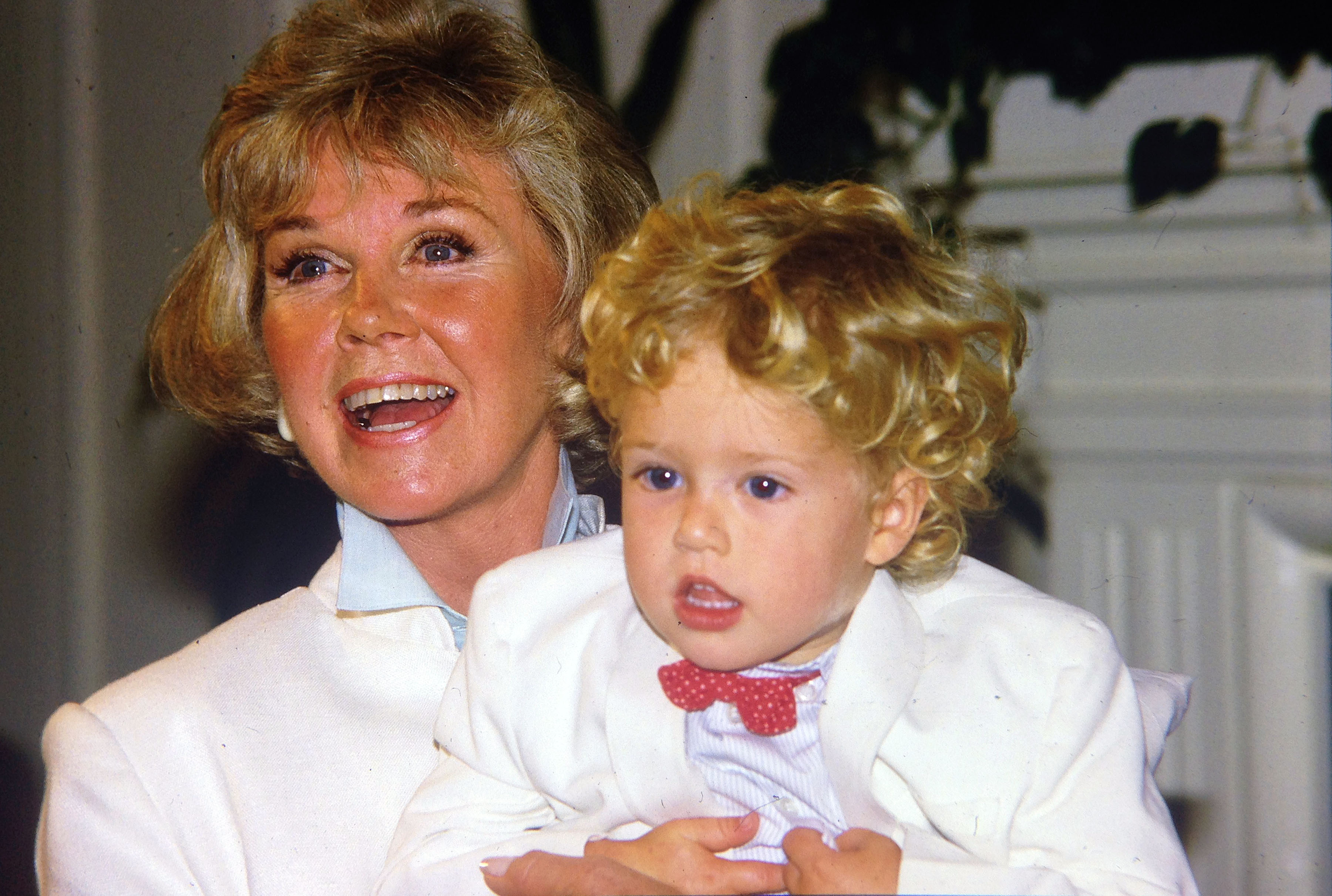 Singer Doris Day with her grandson Ryan Melcher at a press conference on July 16, 1985 in Carmel, California | Source: Getty Images
