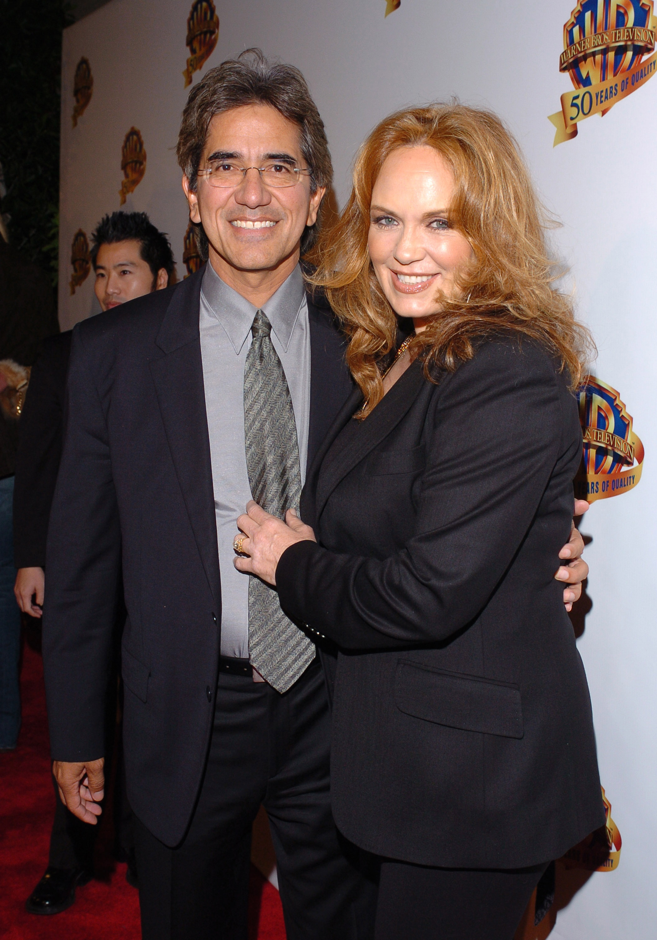 Peter Lopez and Catherine Bach at Warner Bros. Television and Warner Home Video 50 Years of Celebration in 2010 | Source: Getty Images
