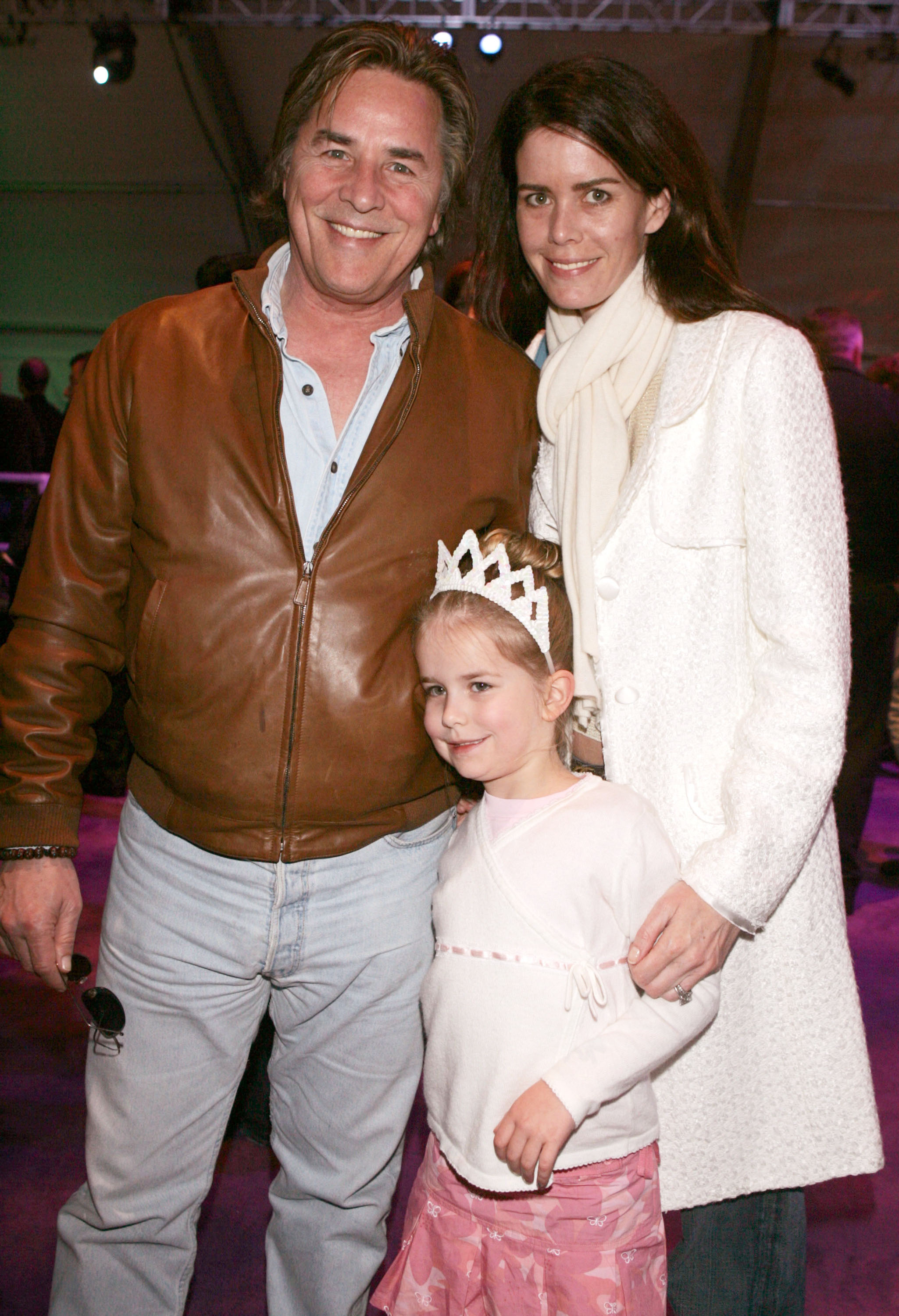 Don Johnson, his daughter Afterton Grace Johnson, and his wife Kelly Phleger pose at the "The Ice Princess" after party on March 13, 2005, in Hollywood, California | Source: Getty Images