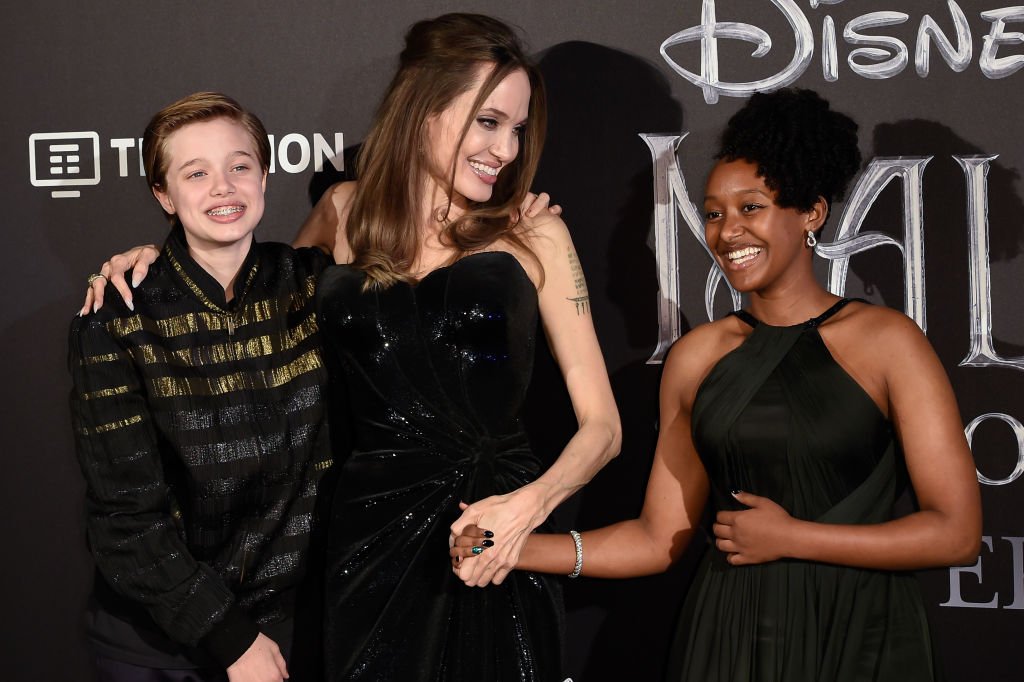 Angelina Jolie and her children Shiloh Nouvel Jolie-Pitt and Zahara Marley Jolie-Pitt during the European premiere of the Disney film Maleficent Lady of Evil on October 7th, 2019 | Photo: Getty Images