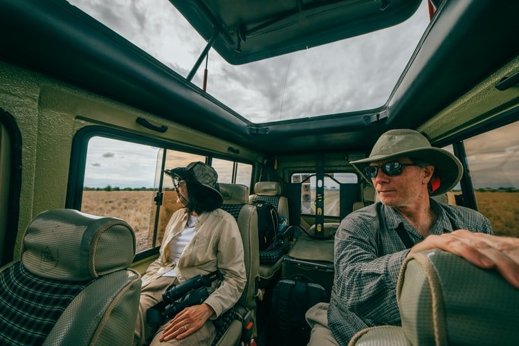 A family taking a ride through a safari. | Photo: Unsplash 