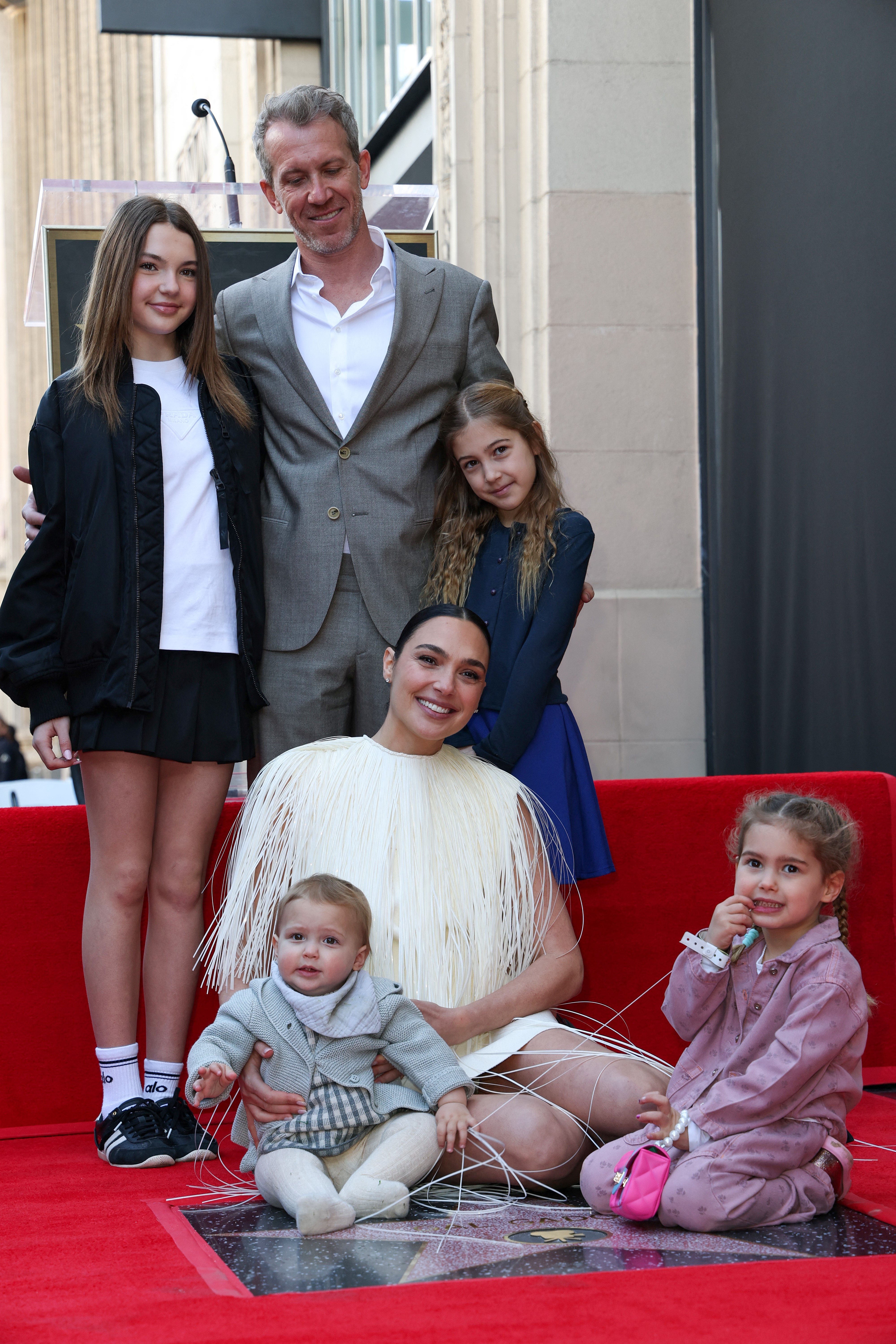 Alma, Jaron, Ori, Maya, Gal Gadot, and Daniella Varsano attend her Hollywood Walk of Fame Star Ceremony in front of El Capitan in Los Angeles, California, on March 18, 2025 | Source: Getty Images