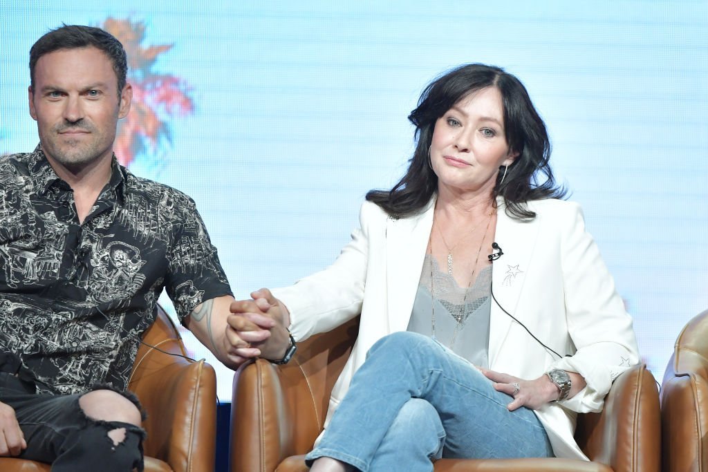 Brian Austin Green and Shannen Doherty hold hands as they speak during the Fox segment of the 2019 Summer TCA Press Tour, at The Beverly Hilton Hotel, on August 7, 2019, in Beverly Hills, California | Source: Amy Sussman/Getty Images