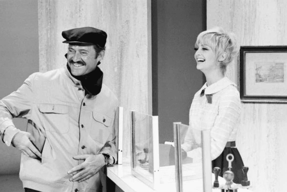 Dan Rowan and Goldie Hawn behind the scenes for "Laugh In" | Source: Getty Images