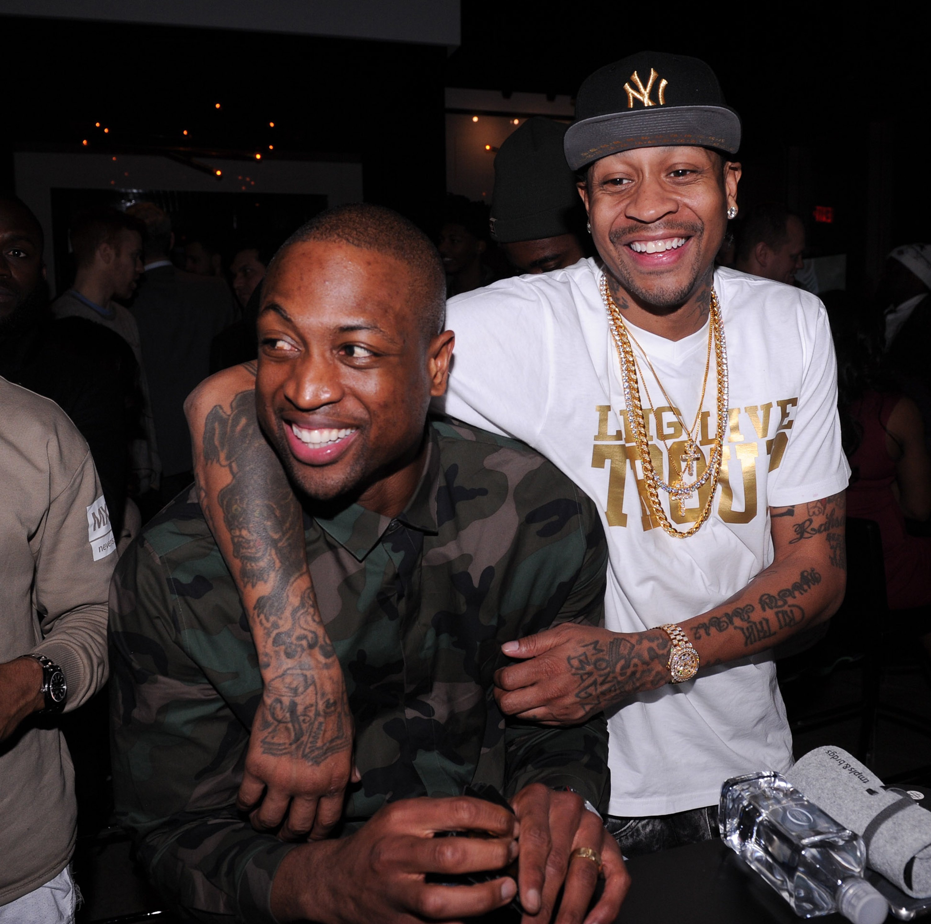 Dwyane Wade and Allen Iverson sharing a laugh during the former's Spade Tournament at The One Eighty in February 2016. | Photo: Getty Images