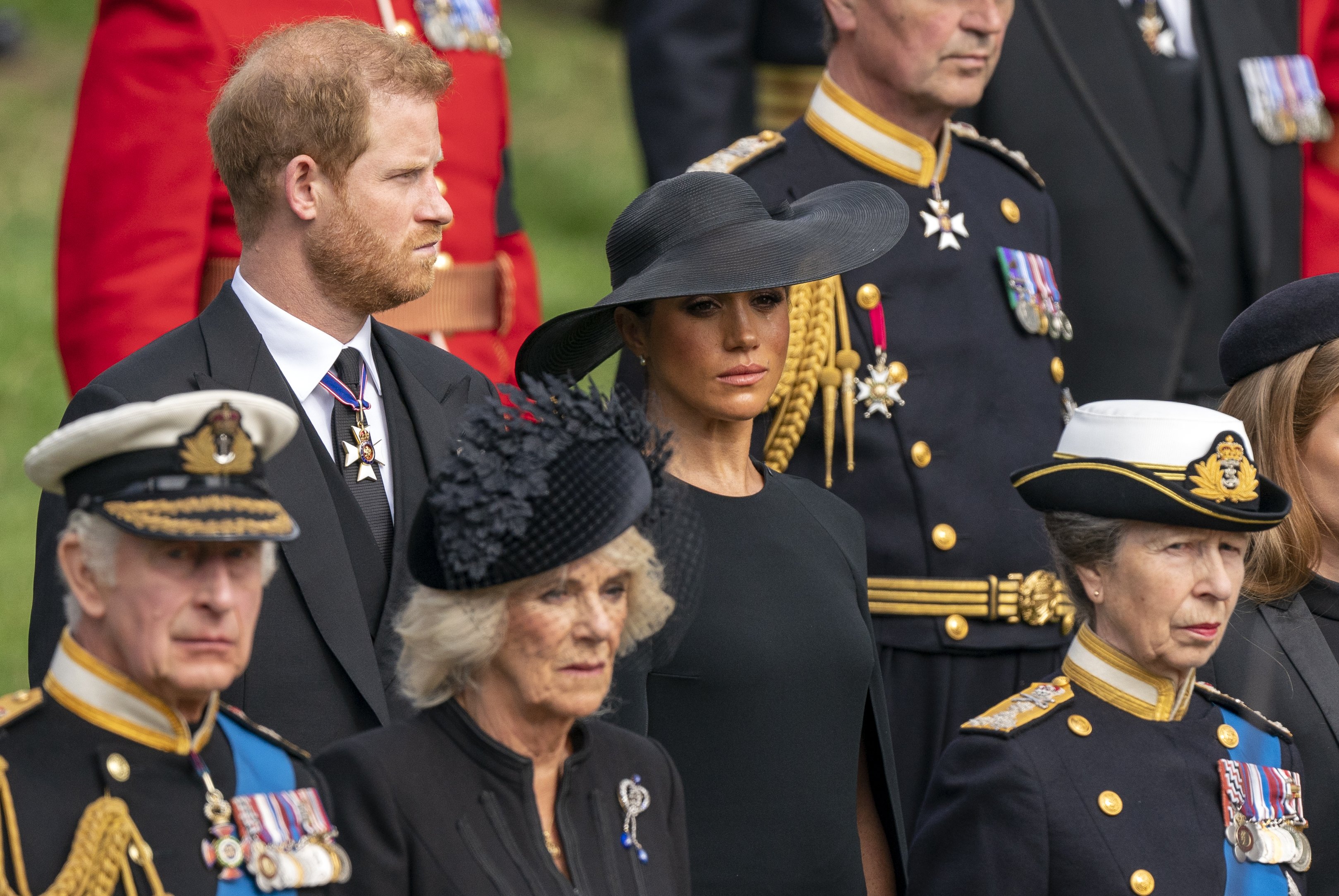Prince Harry and Duchess Meghan look on as the State Gun Carriage carrying the coffin of Queen Elizabeth II arrive at Wellington Arch during the Ceremonial Procession in London on September 19, 2022 | Source: Getty Images